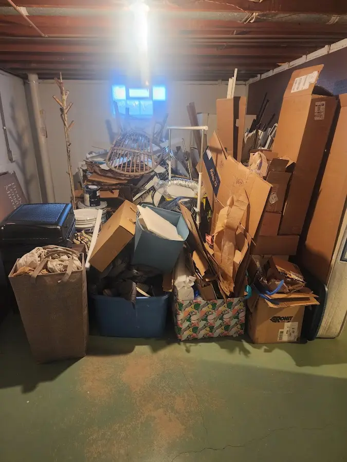 Roll-off dumpster container at job site for Construction Dumpster Rental in Tiffin